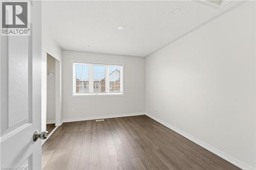 Unfurnished bedroom carpet free - 100 Beddoe Drive Unit# 25, Hamilton, ON - Indoor Photo Showing Other Room