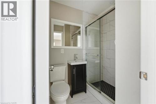 Bathroom with vanity, a stall shower, and light marble finish floors - 100 Beddoe Drive Unit# 25, Hamilton, ON - Indoor Photo Showing Bathroom