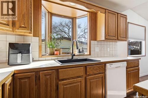 26 Mill Bay, Regina, SK - Indoor Photo Showing Kitchen With Double Sink