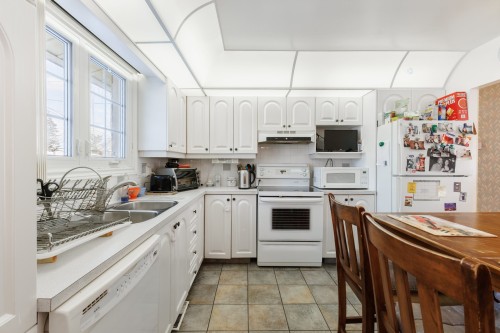 Cuisine - 3 Rue Lacroix, Dollard-Des-Ormeaux, QC - Indoor Photo Showing Kitchen With Double Sink