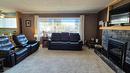 707 12Th Avenue, Cranbrook, BC  - Indoor Photo Showing Living Room With Fireplace 