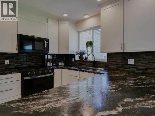 1750 Beach Crescent, Quesnel, BC - Indoor Photo Showing Kitchen With Double Sink