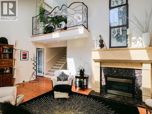 1750 Beach Crescent, Quesnel, BC - Indoor Photo Showing Living Room With Fireplace