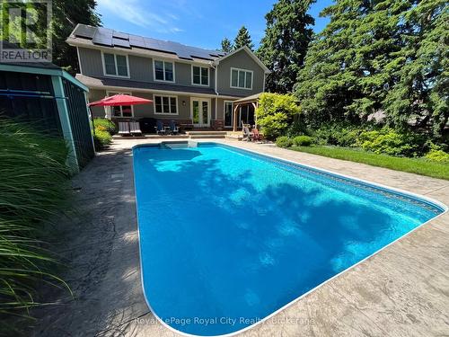 Heated in-ground saltwater pool - 255 Normandy Avenue, Waterloo, ON - Outdoor With In Ground Pool With Deck Patio Veranda