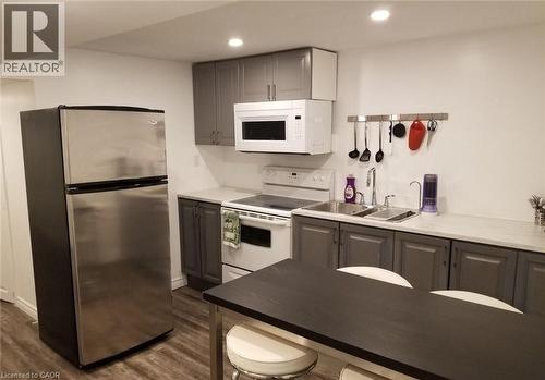 1601 Sandgate Crescent, Mississauga, ON - Indoor Photo Showing Kitchen With Double Sink