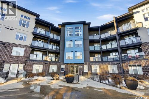 409 5301 Universal Crescent, Regina, SK - Outdoor With Balcony With Facade