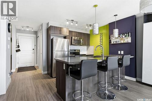 409 5301 Universal Crescent, Regina, SK - Indoor Photo Showing Kitchen With Stainless Steel Kitchen With Upgraded Kitchen