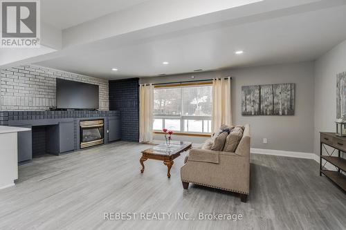910 Concession Rd 17 W, Tiny, ON - Indoor Photo Showing Living Room With Fireplace