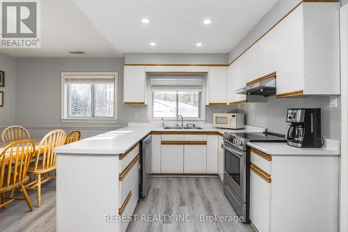 910 Concession Rd 17 W, Tiny, ON - Indoor Photo Showing Kitchen With Double Sink