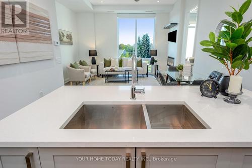610 - 42 Mill Street, Halton Hills, ON - Indoor Photo Showing Kitchen With Double Sink