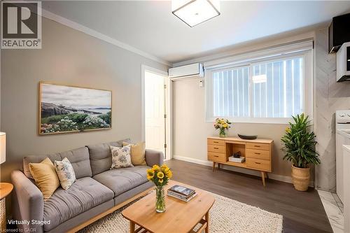 Virtually Staged - 34 Burn Place Unit# 5, Kitchener, ON - Indoor Photo Showing Living Room