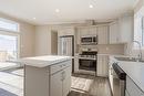 133 Prairie Oaks Drive, Mitchell, MB  - Indoor Photo Showing Kitchen With Stainless Steel Kitchen With Double Sink 