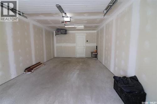 3-4 75 And 85 Atlantic Avenue, Kerrobert, SK - Indoor Photo Showing Garage
