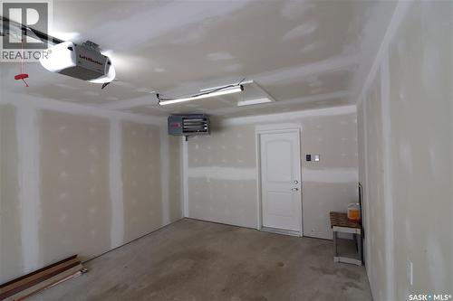 3-4 75 And 85 Atlantic Avenue, Kerrobert, SK - Indoor Photo Showing Garage