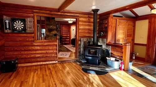 785 Beech Road, Nakusp, BC - Indoor Photo Showing Other Room With Fireplace