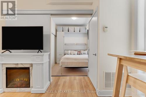 104 - 360 Cumberland Street, Ottawa, ON - Indoor Photo Showing Other Room With Fireplace