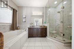 Primary Ensuite Bathroom (Main Floor) - 