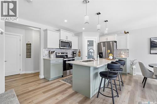 535 Schmeiser Avenue, Saskatoon, SK - Indoor Photo Showing Kitchen With Stainless Steel Kitchen With Double Sink With Upgraded Kitchen