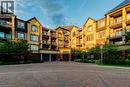 3060 Rotary Way Unit# 404, Burlington, ON  - Outdoor With Balcony With Facade 