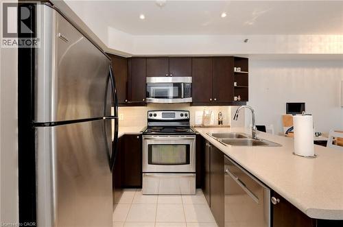 3060 Rotary Way Unit# 404, Burlington, ON - Indoor Photo Showing Kitchen With Double Sink