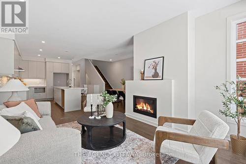 1003 Kitigan Grove, Ottawa, ON - Indoor Photo Showing Living Room With Fireplace