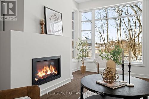 1003 Kitigan Grove, Ottawa, ON - Indoor Photo Showing Living Room With Fireplace