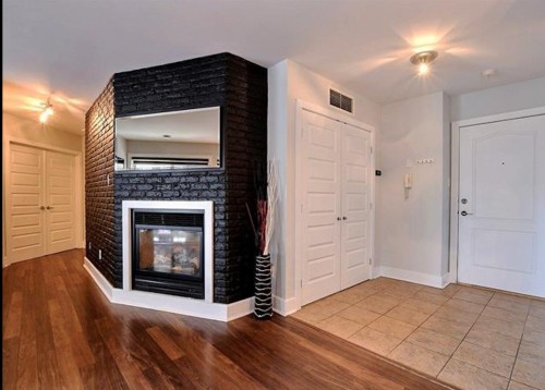Mud Room - 205-65 Rue Des Manoirs, Charlemagne, QC - Indoor With Fireplace
