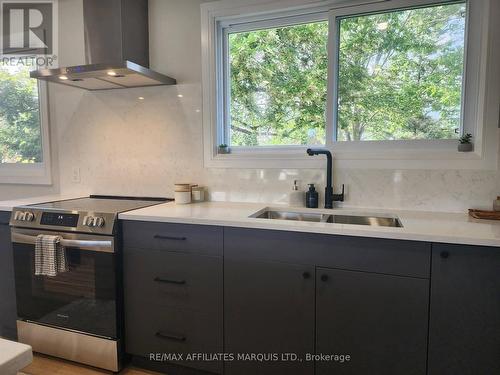 1409 Leonard Avenue, Cornwall, ON - Indoor Photo Showing Kitchen With Double Sink