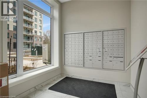 View of home's community with mail area - 103 Roger Street Unit# 310, Waterloo, ON - Indoor Photo Showing Other Room