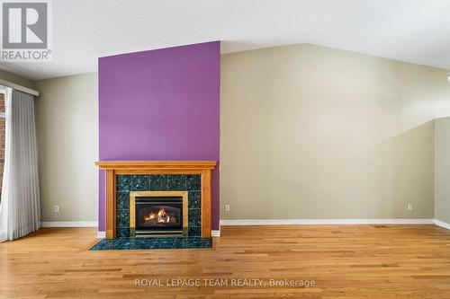 10 Quinterra Court, Ottawa, ON - Indoor Photo Showing Living Room With Fireplace