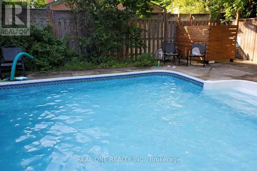Pool with Fenced Shower Shed - Summer View - 1585 Crombie Road, Mississauga, ON - Outdoor With In Ground Pool