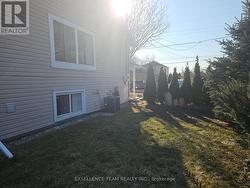 Side Yard. Treed/Fenced - 