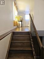 Split entry raised semi.Entrance leading to LR. - 