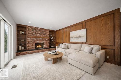 823 Richards Cr Nw, Edmonton, AB - Indoor Photo Showing Living Room With Fireplace