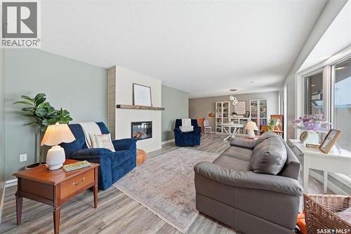 217 13Th Avenue E, Watrous, SK - Indoor Photo Showing Living Room With Fireplace