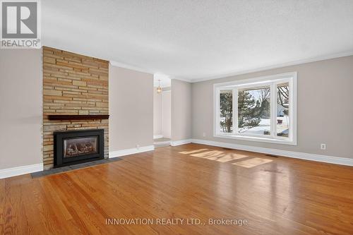 Living Room - 1951 Garfield Avenue, Ottawa, ON - Indoor Photo Showing Living Room With Fireplace