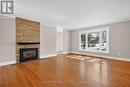 Living Room - 1951 Garfield Avenue, Ottawa, ON  - Indoor Photo Showing Living Room With Fireplace 