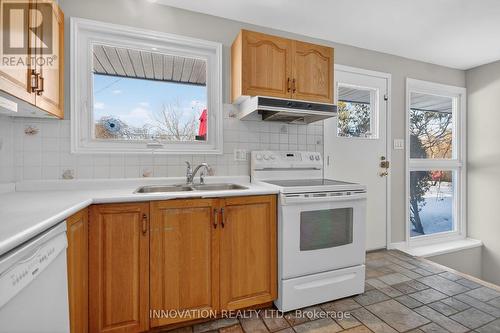 Includes appliances - 1951 Garfield Avenue, Ottawa, ON - Indoor Photo Showing Kitchen With Double Sink