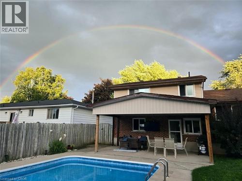 218 Arris Crescent, Mitchell, ON - Outdoor With In Ground Pool