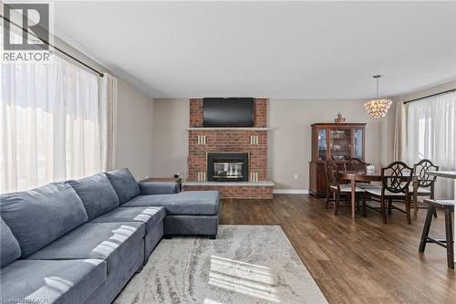 218 Arris Crescent, Mitchell, ON - Indoor Photo Showing Living Room With Fireplace
