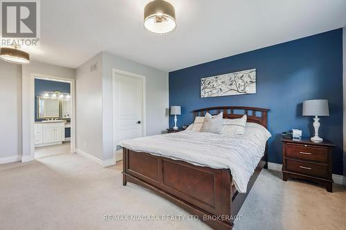 Spacious master bedroom w/walk-in closet & ensuite - 2231 Seventh Street, St. Catharines (Rural Fourth), ON - Indoor Photo Showing Bedroom