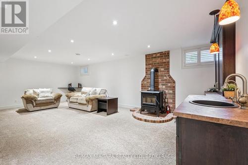 Cozy wood burning fireplace for cold winter nights - 2231 Seventh Street, St. Catharines (Rural Fourth), ON - Indoor With Fireplace