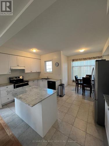 3836 Tufgar Crescent, Burlington, ON - Indoor Photo Showing Kitchen With Double Sink
