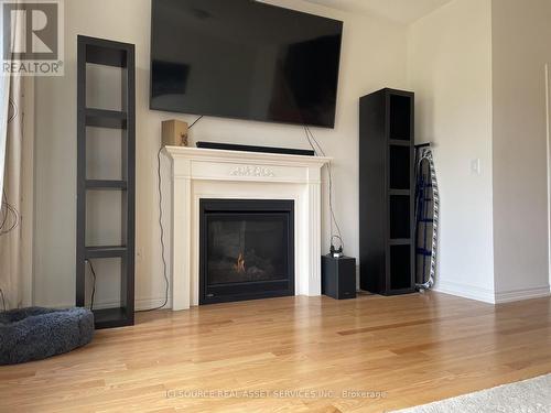 3836 Tufgar Crescent, Burlington, ON - Indoor Photo Showing Living Room With Fireplace