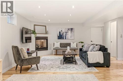 411 Pepper Drive, Burlington, ON - Indoor Photo Showing Living Room With Fireplace
