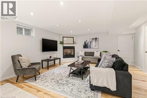 411 Pepper Drive, Burlington, ON - Indoor Photo Showing Living Room With Fireplace
