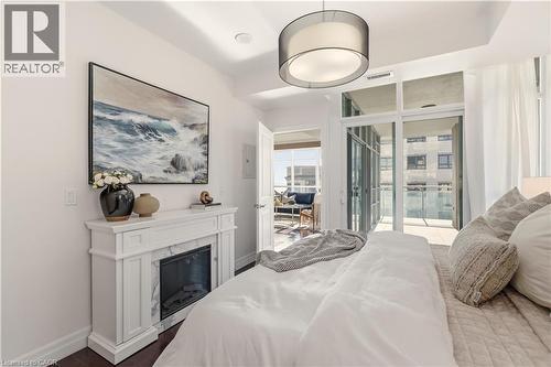 360 Pearl Street Unit# 804, Burlington, ON - Indoor Photo Showing Bedroom With Fireplace