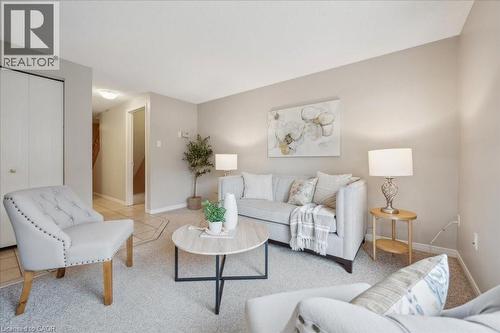 Living room featuring carpet flooring - 66 Rodgers Road Unit# 2, Guelph, ON - Indoor Photo Showing Living Room