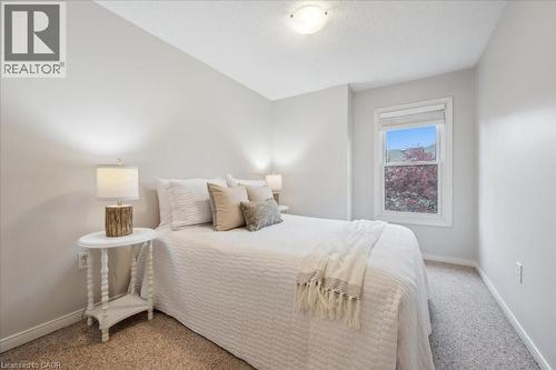 Carpeted bedroom with baseboards - 66 Rodgers Road Unit# 2, Guelph, ON - Indoor Photo Showing Bedroom