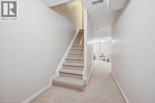 Stairs with carpet - 66 Rodgers Road Unit# 2, Guelph, ON - Indoor Photo Showing Other Room